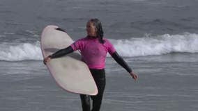 ‘The competition is pretty high’: Surfers 40 and older showcase their skills at Linda Mar Beach  