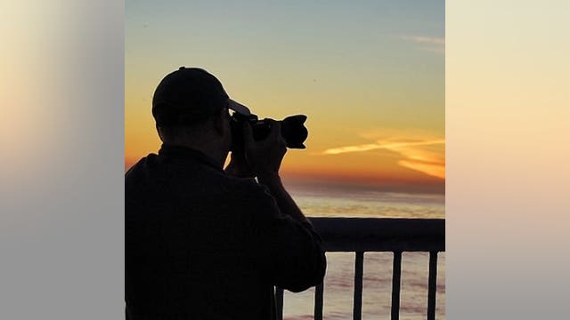 Meet Mark Woodward, the viral photographer capturing Santa Cruz's surfboard-stealing sea otter