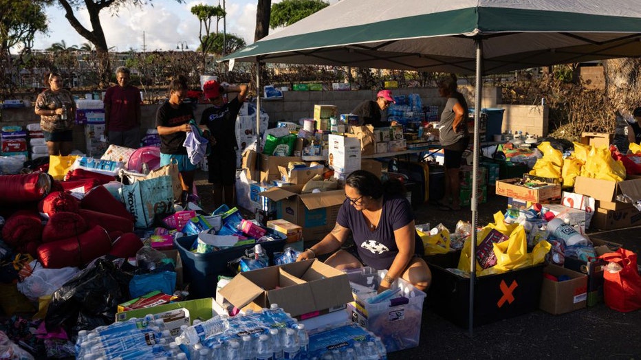 Volunteers-sort-out-supplies-for-survivors.jpg