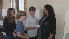 San Mateo brothers, 10 and 13, deliver check for Maui Strong Fund
