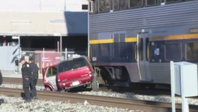 Amtrak train hits SUV in Oakland after driver evades crossing arm, gets dragged on tracks