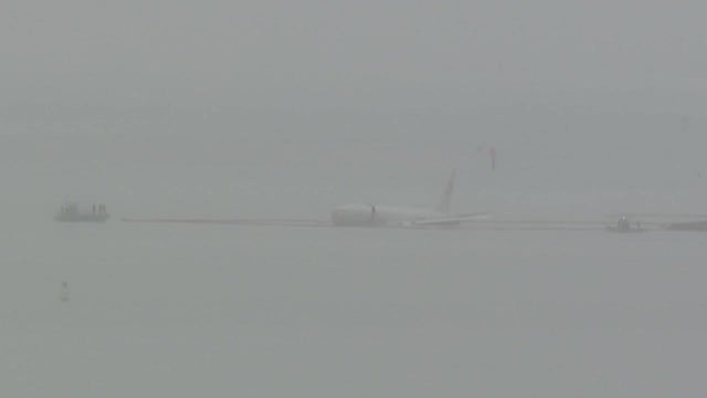 All 9 aboard US Navy plane that overshot runway escape injury, Hawaii official says