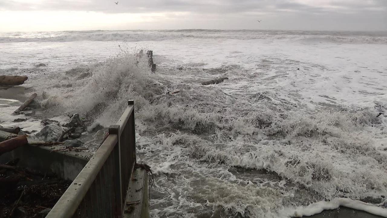 Evacuation warnings lifted after high surf and flooding shut down