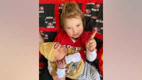 Photos: Faithful 49er fans, including babies and dogs, dress out in red and gold