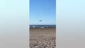 SFFD, CHP perform surf rescue of person at Ocean Beach
