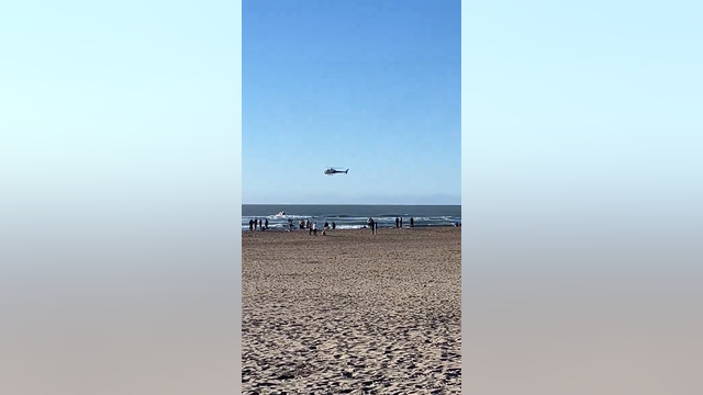 SFFD, CHP perform surf rescue of person at Ocean Beach