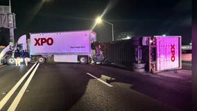 Overturned big rig trailer in Hayward on I-880