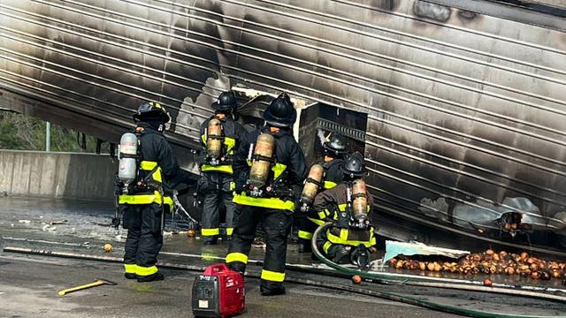 Overturned produce truck catches fire on Bay Bridge