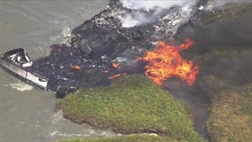 Redwood City boat fire: 2 rescued after jumping ship