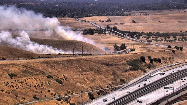 Crews battle vegetation fire near Concord