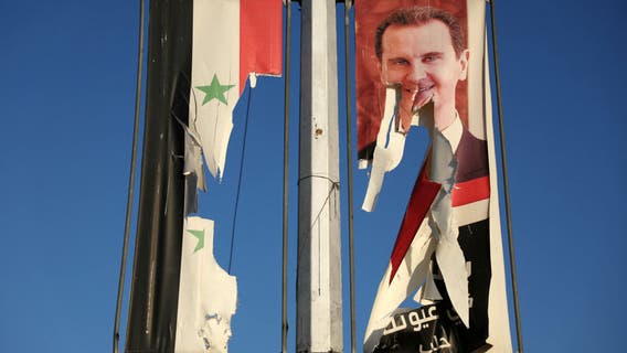 Syrian government appears to have fallen, prime minister says he's ready to hand over gov't to rebels