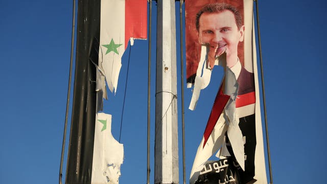 Syrian government appears to have fallen, prime minister says he's ready to hand over gov't to rebels