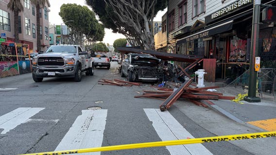2 arrested after SUV driver evading police crashes into parklet, hospitalizing 6