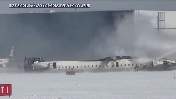 Crash video raises questions about what caused Delta plane to flip over