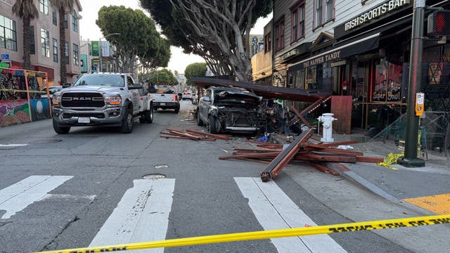 2 arrested after SUV driver evading police crashes into parklet, hospitalizing 6