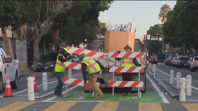 Crews begin repaving center bike lanes on San Francisco's Valencia Street