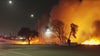 Fire sparks at East 12th Street encampment in East Oakland, after city sweeps the area