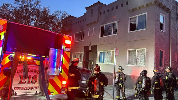 Baby and father rescued from Oakland fire, 20 displaced