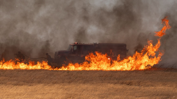 Crews battle wind-driven Midway Fire near Tracy