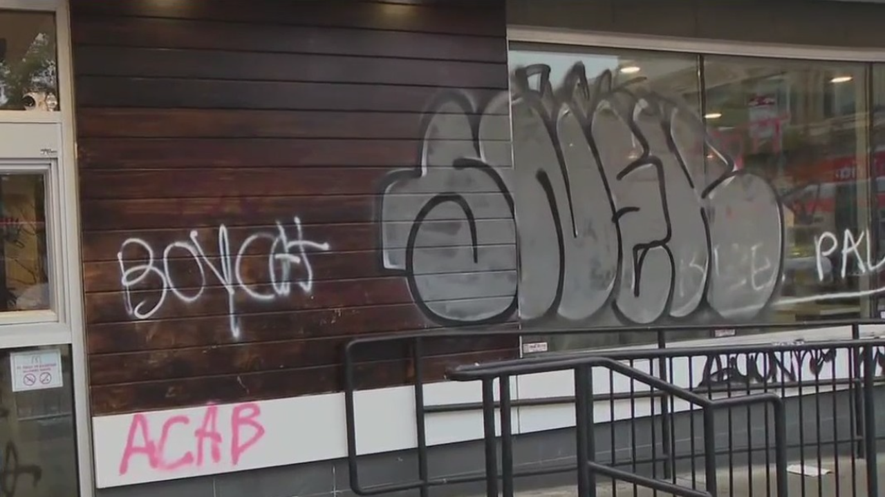 San Francisco police confront splinter group of anti-ICE protesters