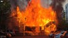 Man faces 18 charges after 4-alarm apartment fire injures 2 in Oregon