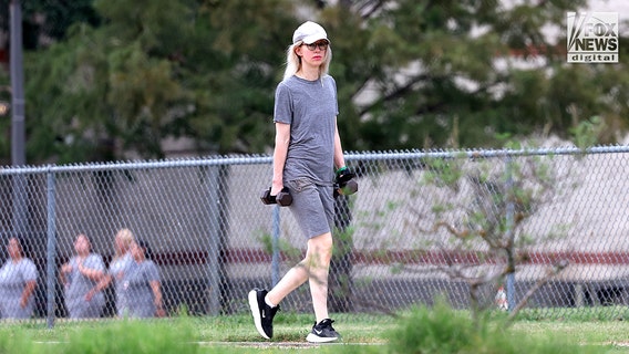 PHOTOS: Elizabeth Holmes caught on camera exercising at Texas prison