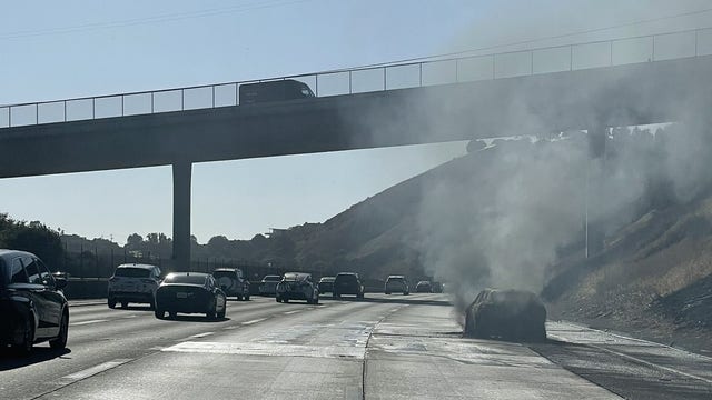 Car fire on Interstate 580 spreads to brush in Castro Valley