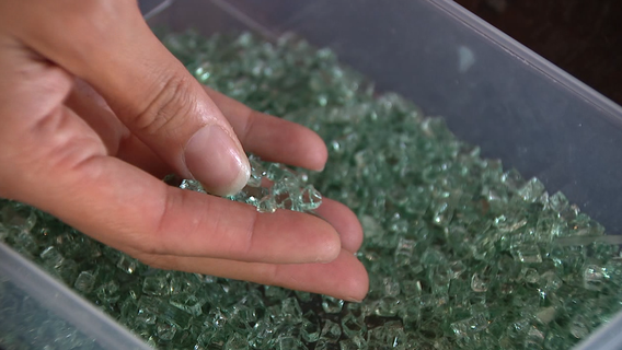 Oakland artist creates earrings from shattered car glass