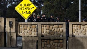 Coast Guard fires rubber bullets at car outside base blockade