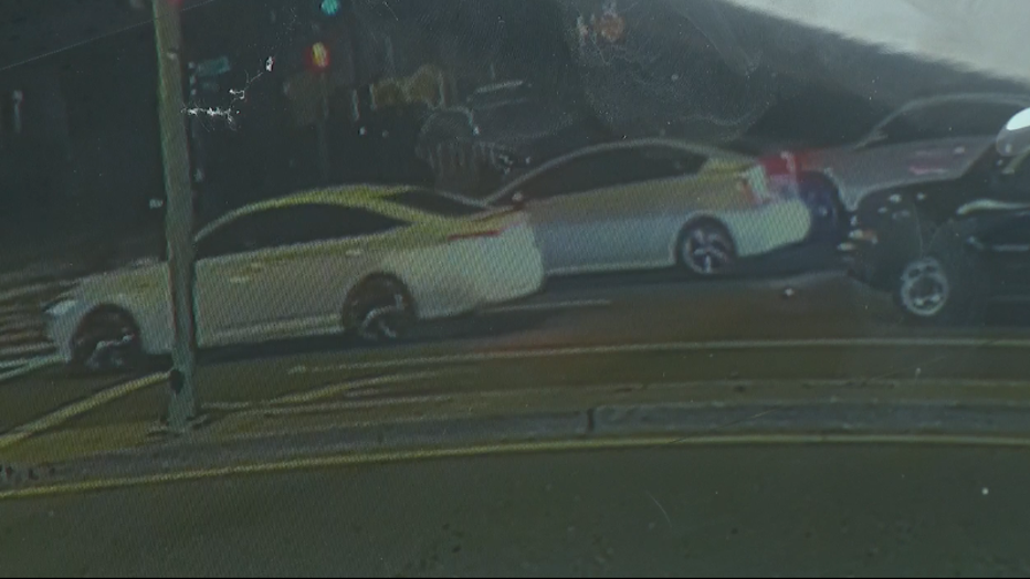 Cars stopped at an intersection.