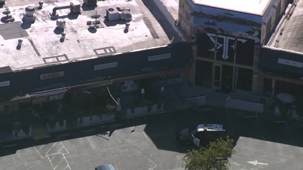 Redwood City liquor store manager chained wrists, set fire: police