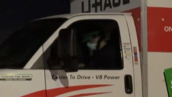 U-Haul driver accused of reversing toward Coast Guard officers faces federal charges