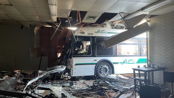 AC Transit bus crashes into Oakland building, sends 11 to hospital