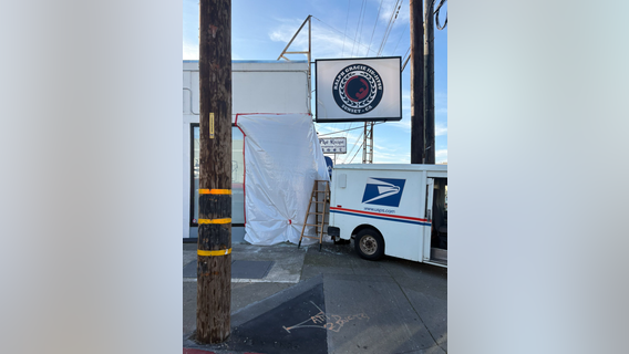 USPS truck backs into building in San Francisco Sunset
