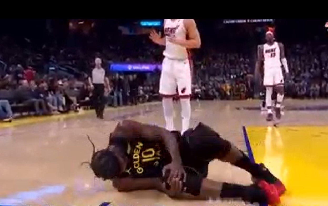 Warriors star Jimmy Butler out for season with torn ACL, team confirms