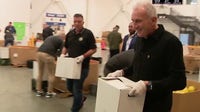 Joe Montana serves the hungry with a game-day beer