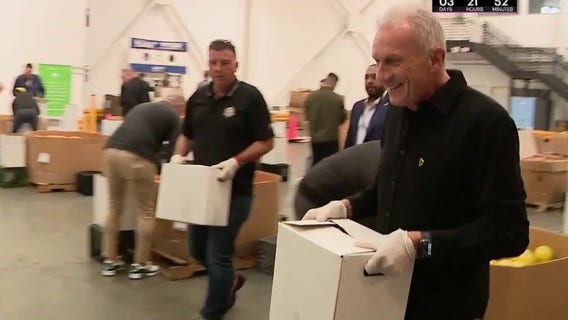 Joe Montana serves the hungry with a game-day beer