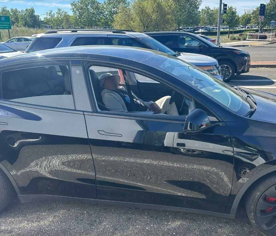 Man passed out in Tesla driving through California city: police