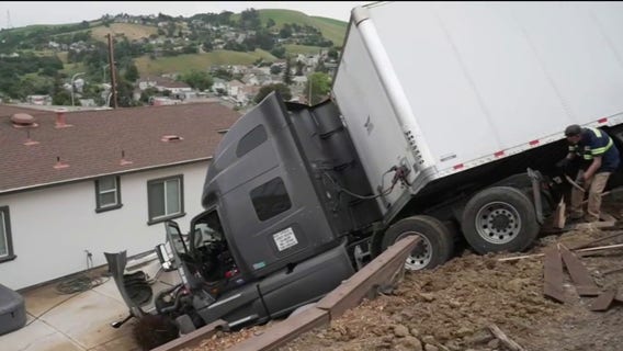 Semi-truck involved in Crockett crash, narrowly misses home