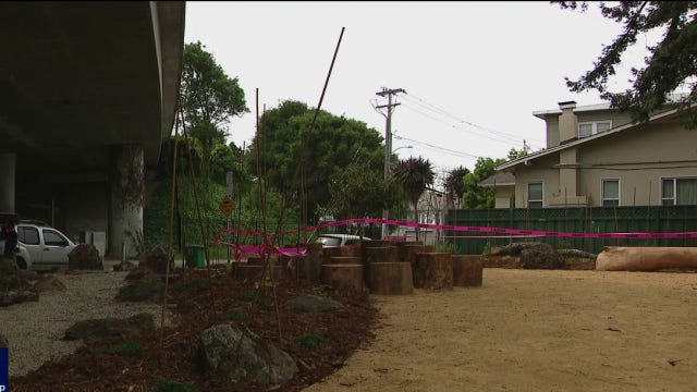 Neighbors complete work on blooming underpass garden in Oakland