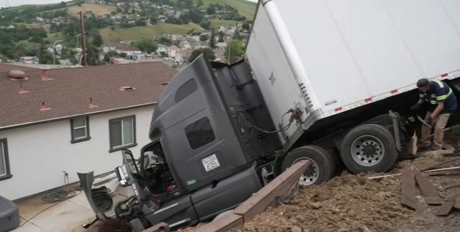 Semi-truck involved in Crockett crash, narrowly misses home