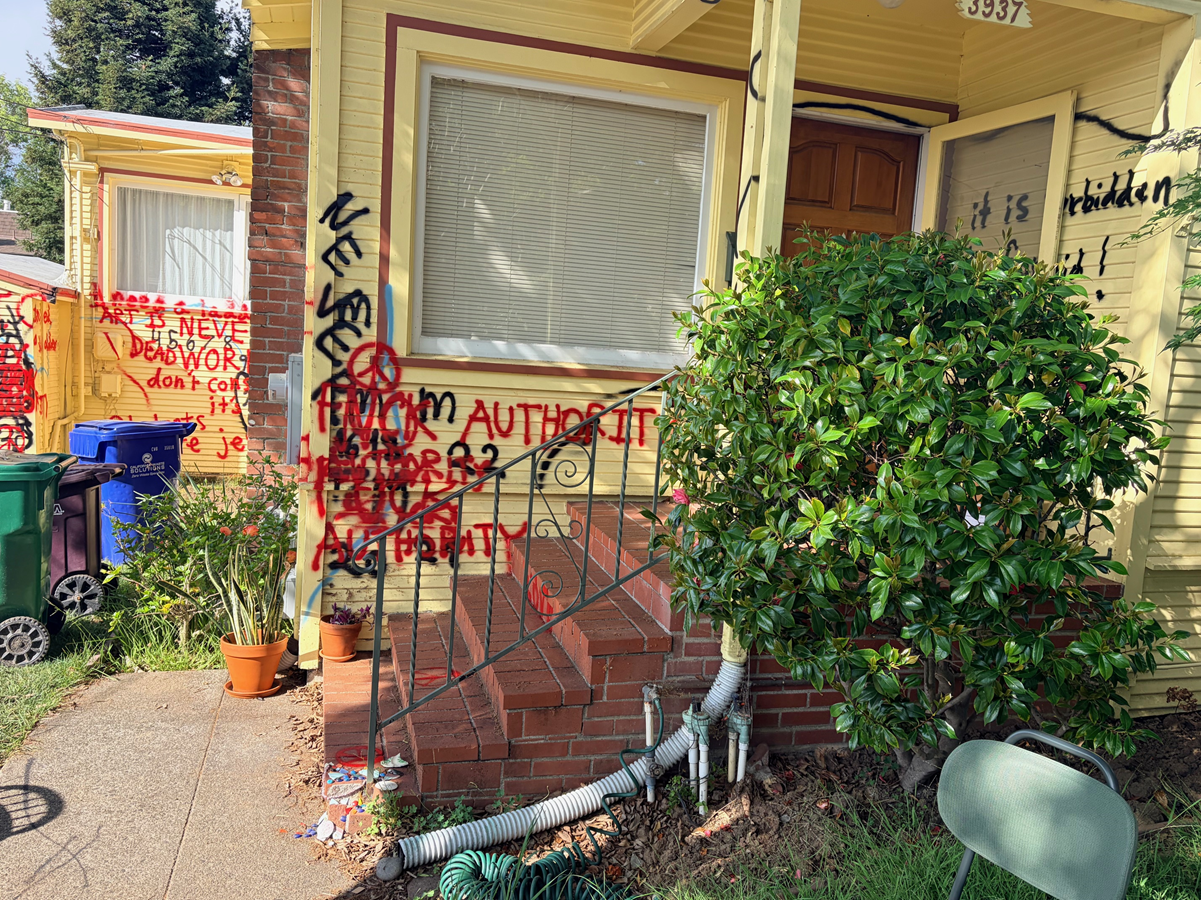 Oakland house covered in odd graffiti, causing neighbor outrage