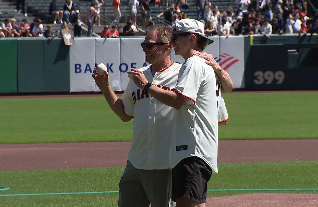 Father and son biking to all MLB parks for St. Jude stop at Giants game