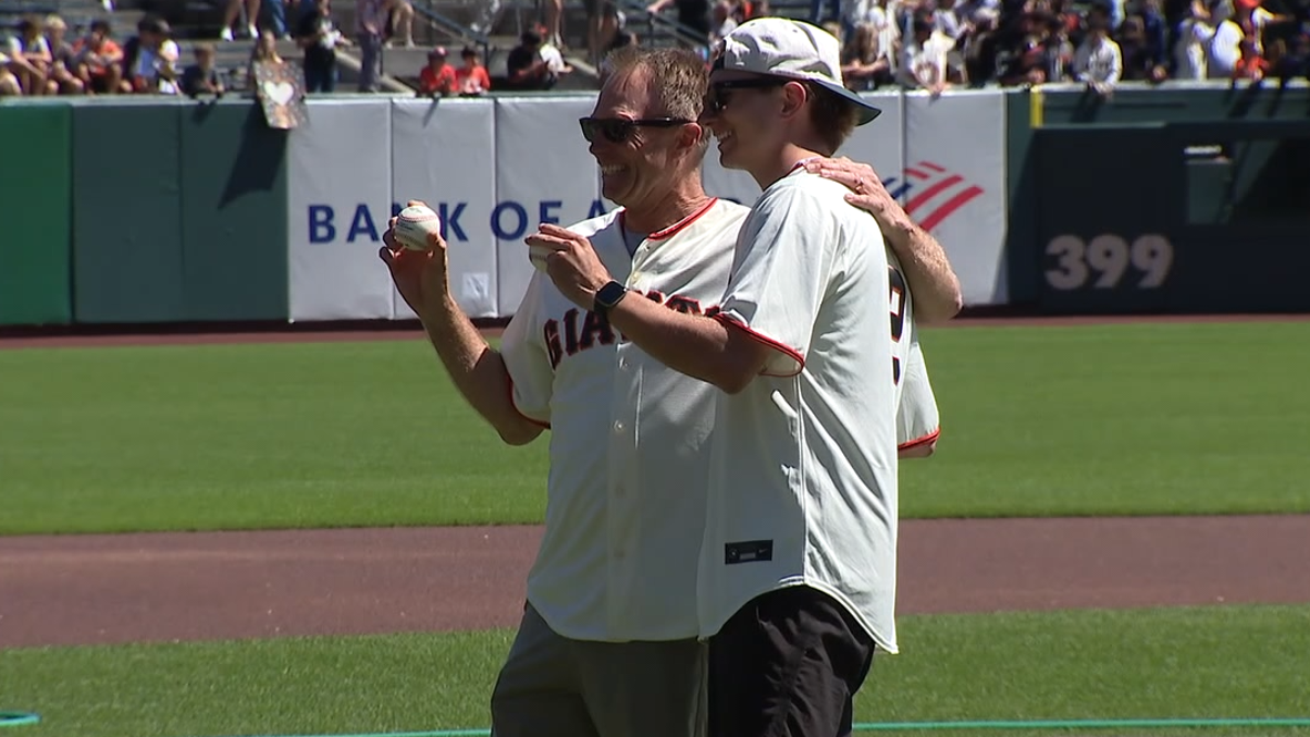 Father and son biking to all MLB parks for St. Jude stop at Giants game