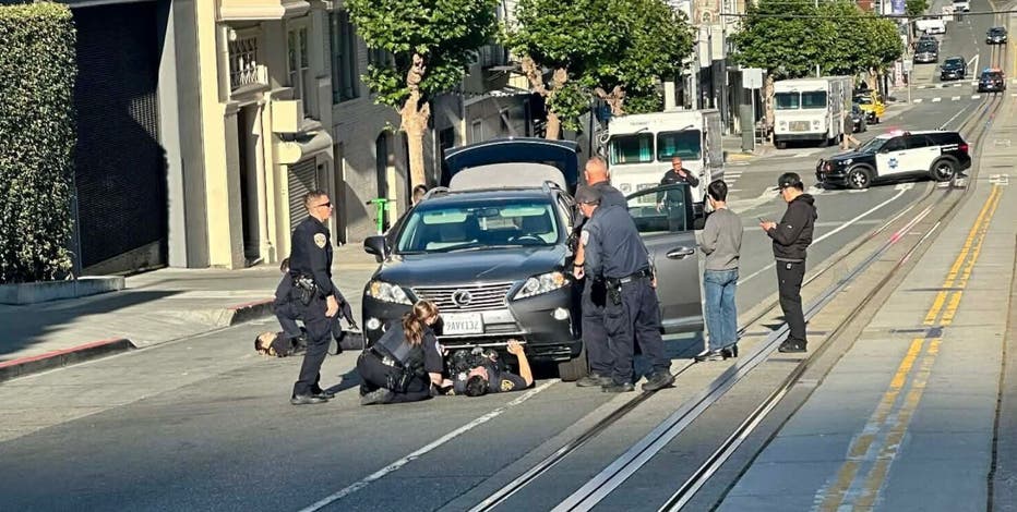 Fleeing Trader Joe's theft suspect killed, SFPD officers pinned by car