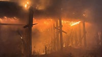Oakland firefighters mopping up blaze that consumed abandoned train trestles near EBMUD facility