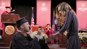 'She Said Yes': Michigan graduate proposes to college sweetheart during commencement