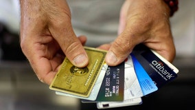 Consumers are piling on credit card debt, flashing signs of potential crisis