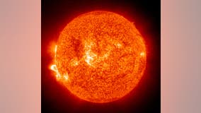 Flashes of light may help scientists predict when solar flares may explode from the sun