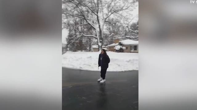 Watch: Girl skates down icy street in Roseville, Minnesota